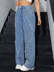 Nicole geniş paça denim, diagonal yırtık dikiş detaylarına sahip açık mavi pantolon